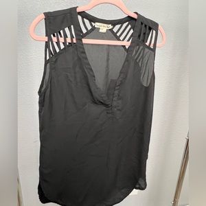 Black sleeveless blouse